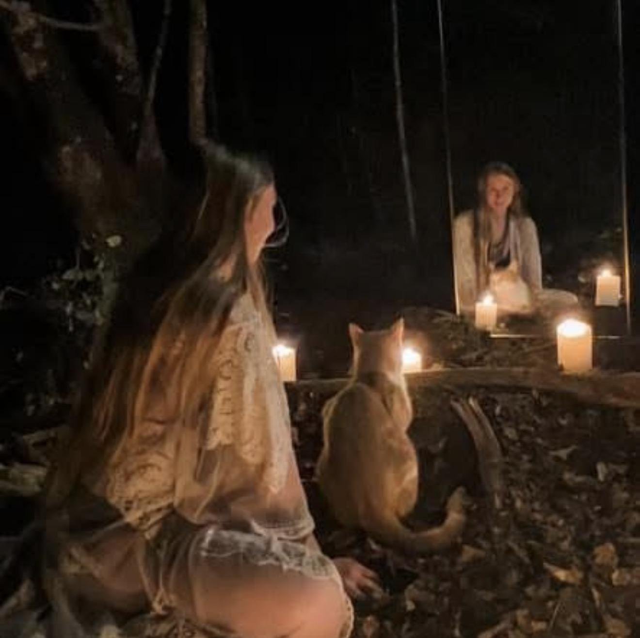 Candlelit circle in the woods